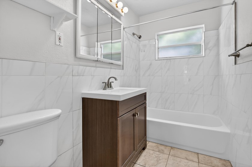 Back on market! Brand new roof completed! Move-in ready 2BR/1BA - photo 16