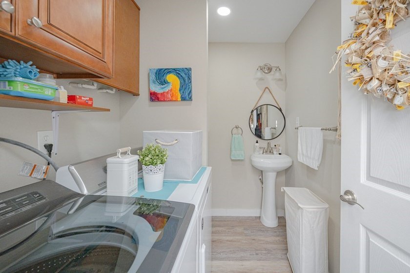 Nestled in the waterfront community of Holiday Beach, this - photo 22