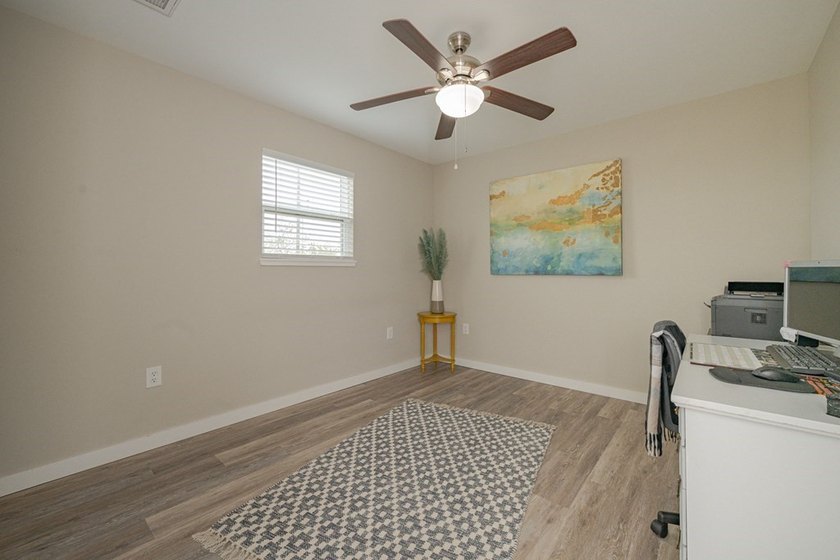 Nestled in the waterfront community of Holiday Beach, this - photo 27