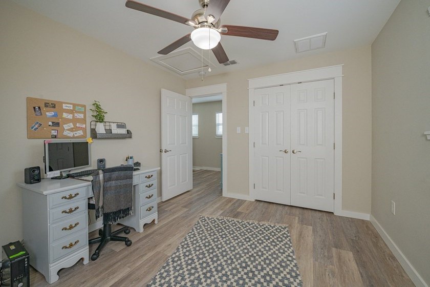 Nestled in the waterfront community of Holiday Beach, this - photo 28