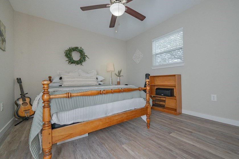 Nestled in the waterfront community of Holiday Beach, this - photo 32