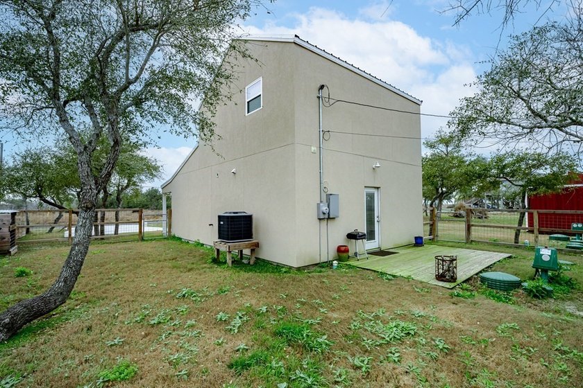 Nestled in the waterfront community of Holiday Beach, this - photo 35