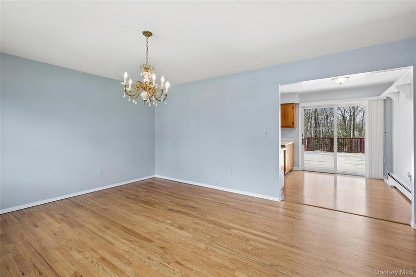 This lovely Hampton Bays residence sits on .47 acres and offers - photo 2