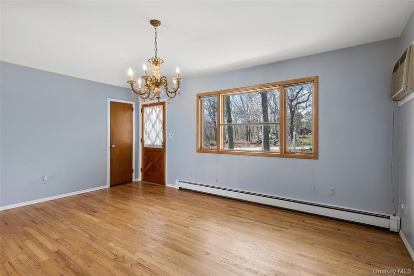 This lovely Hampton Bays residence sits on .47 acres and offers - photo 5
