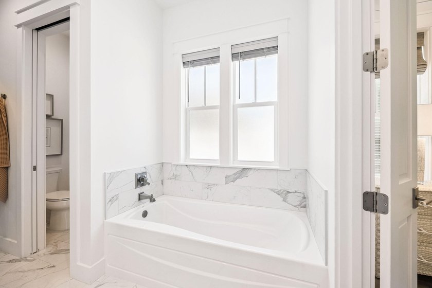 Located in WaterSound Origins, this Ficus plan built by Huff - photo 21