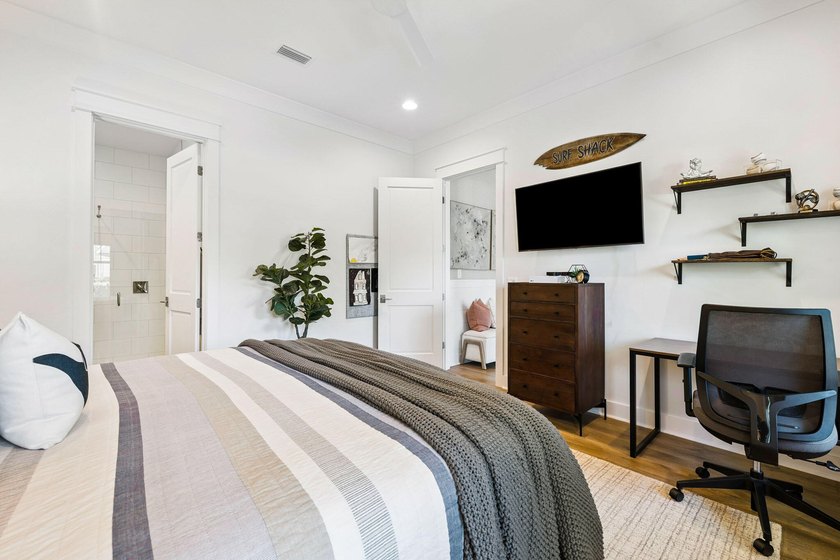 Located in WaterSound Origins, this Ficus plan built by Huff - photo 25