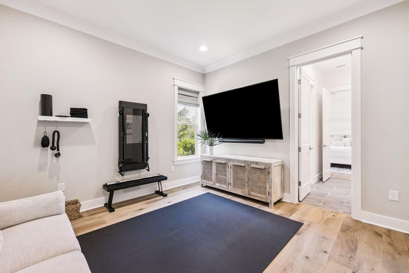 Located in WaterSound Origins, this Ficus plan built by Huff - photo 31