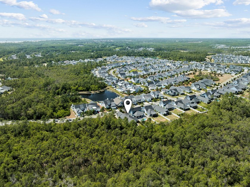 Located in WaterSound Origins, this Ficus plan built by Huff - photo 45