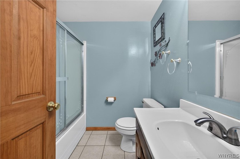 Welcome to 1890 Center Road in West Seneca! Set on 1.2 beautiful - photo 20