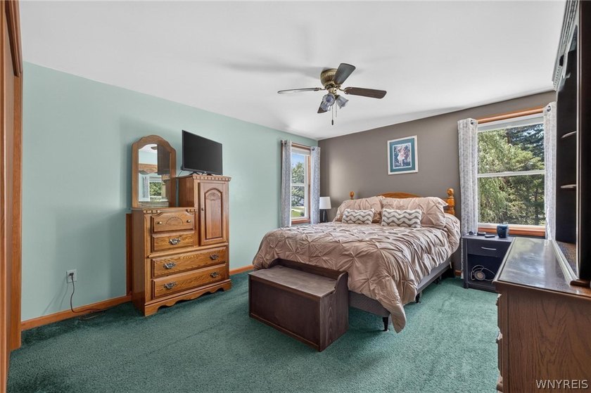 Welcome to 1890 Center Road in West Seneca! Set on 1.2 beautiful - photo 27