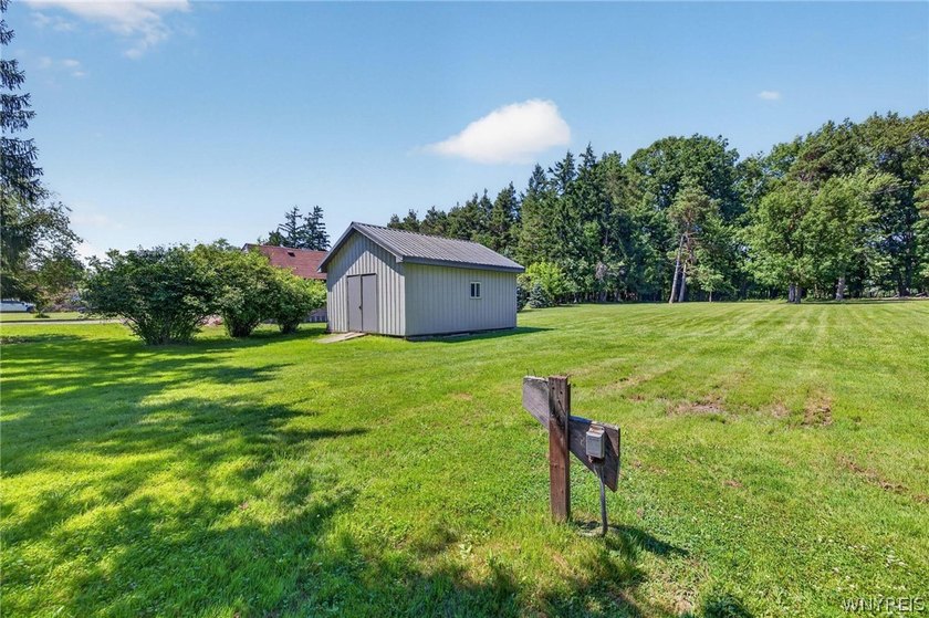 Welcome to 1890 Center Road in West Seneca! Set on 1.2 beautiful - photo 41