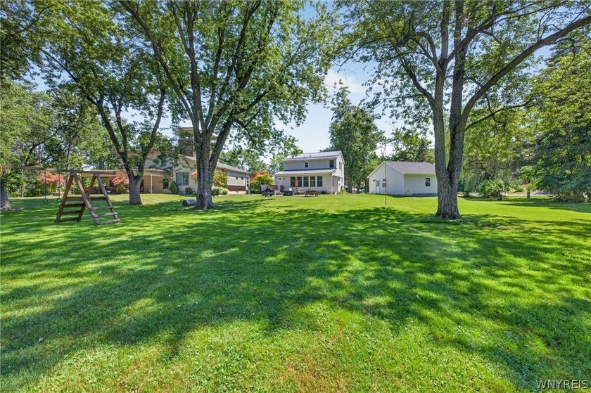 Welcome to 1890 Center Road in West Seneca! Set on 1.2 beautiful - photo 42