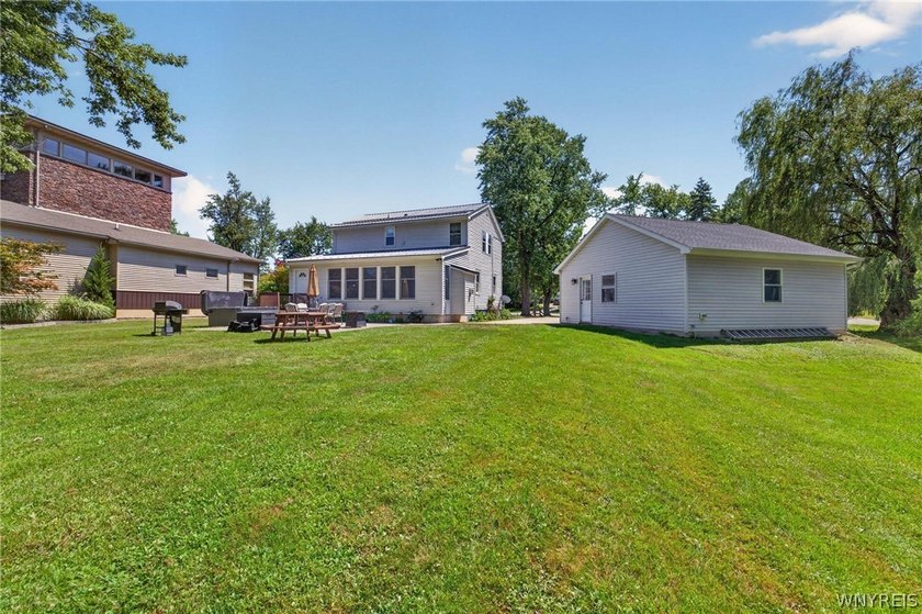 Welcome to 1890 Center Road in West Seneca! Set on 1.2 beautiful - photo 45