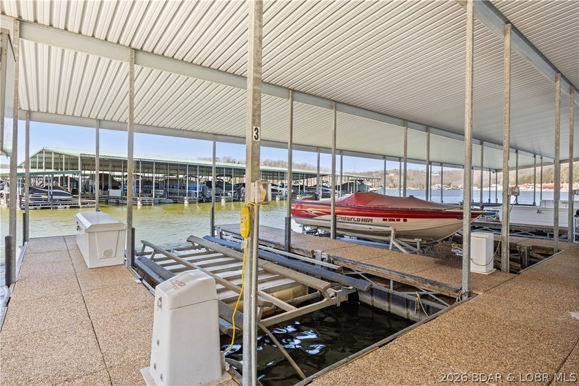 Fully furnished with boat slip &amp; garage. Experience lakefront - photo 24