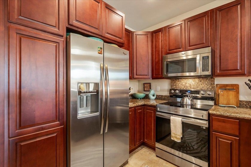Welcome to Kai Ani Village, Unit 15-101, situated in the heart - photo 17