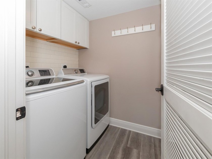 If you've been searching for a spacious townhome that lives like - photo 14