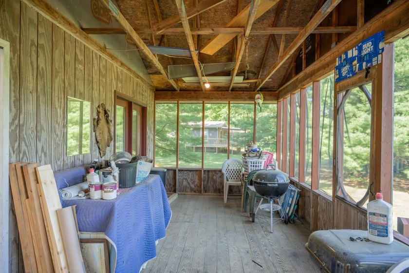 Escape to this charming Lake Front cabin, nestled on 1.7 acres - photo 23