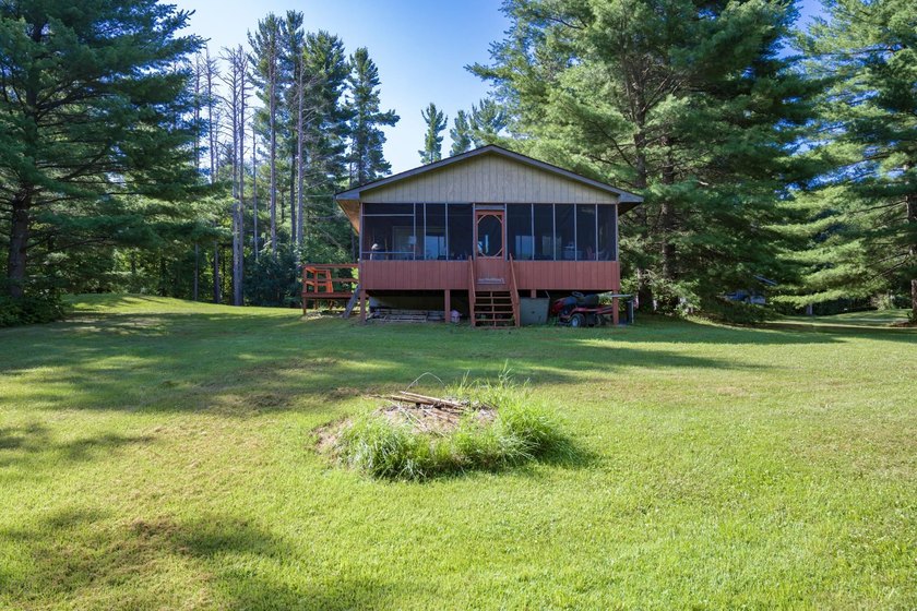 Escape to this charming Lake Front cabin, nestled on 1.7 acres - photo 30