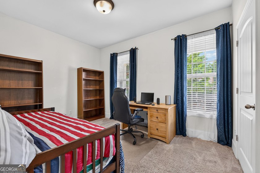 This charming 3-bedroom, 2-bath home is nestled in the sought - photo 24