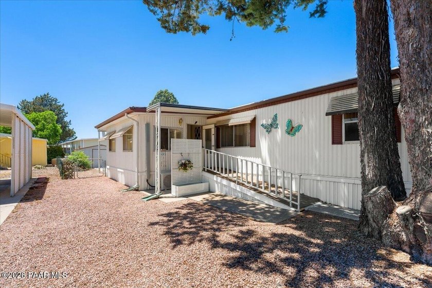 Improved Price! Enjoy low-maintenance living in this updated - photo 2