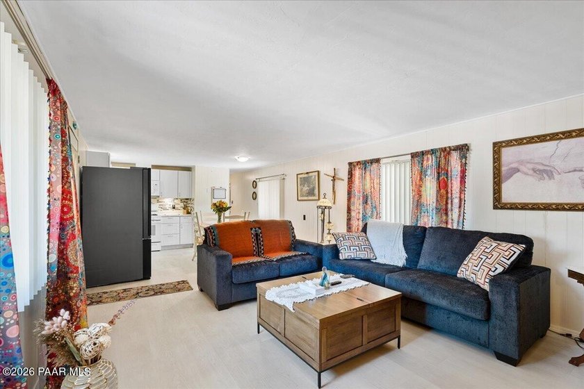 Improved Price! Enjoy low-maintenance living in this updated - photo 3