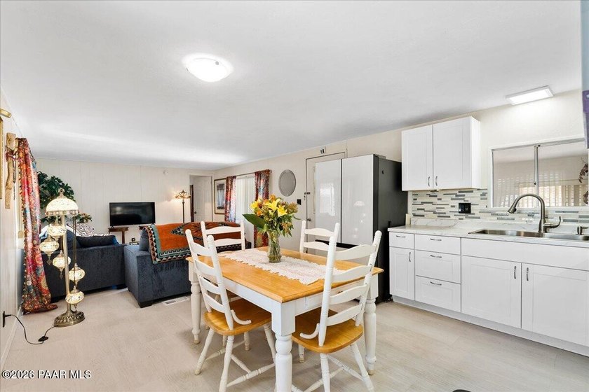 Improved Price! Enjoy low-maintenance living in this updated - photo 4