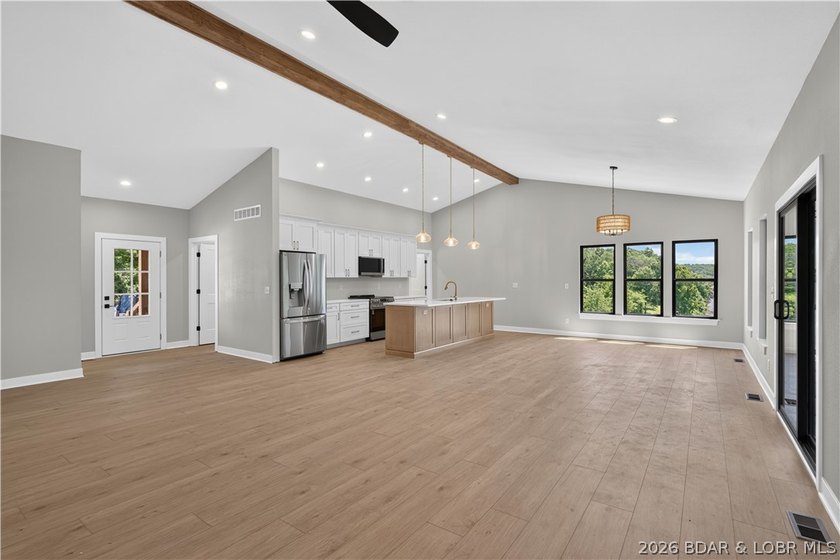 Stunning new-construction waterfront home at the Lake of the - photo 16