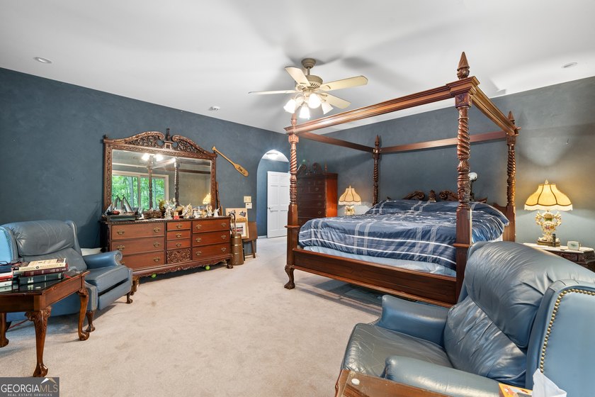 Set along the shores of Lake Lanier, this thoughtfully designed - photo 16
