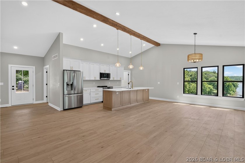 Stunning new-construction waterfront home at the Lake of the - photo 17