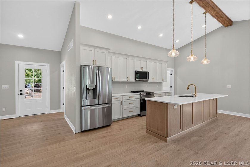 Stunning new-construction waterfront home at the Lake of the - photo 18