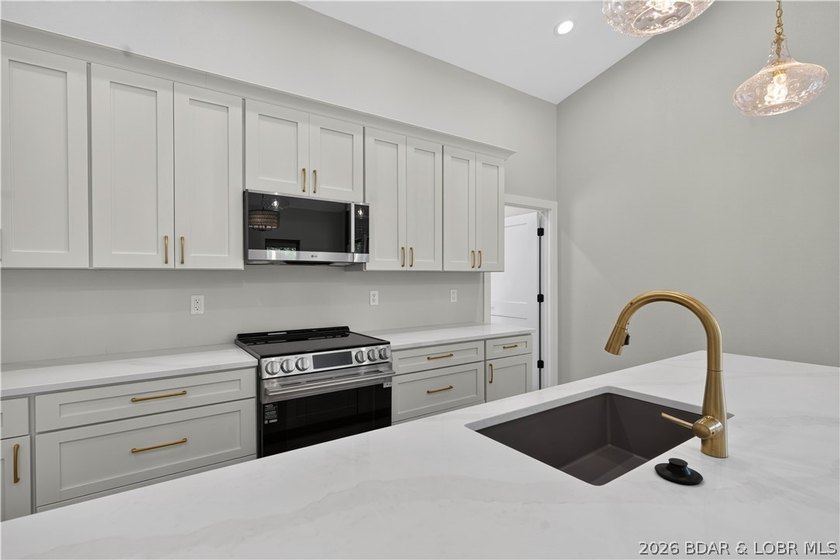 Stunning new-construction waterfront home at the Lake of the - photo 20