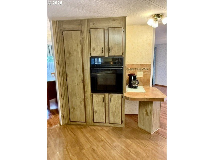 Welcome to this well-maintained 1,410-square-foot home nestled - photo 21