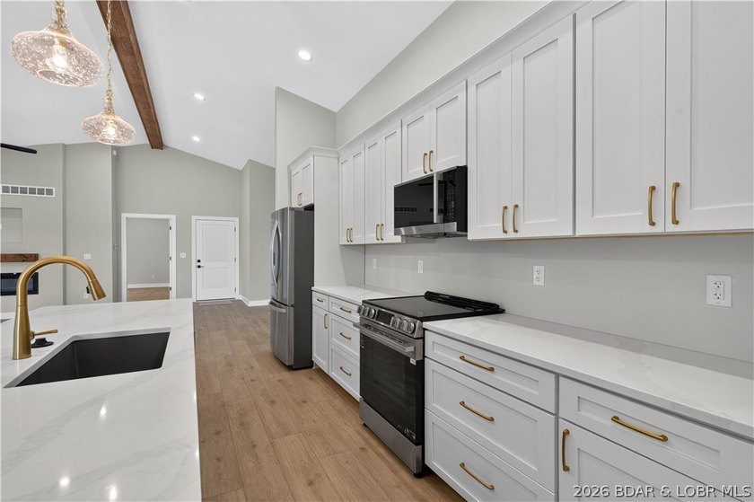 Stunning new-construction waterfront home at the Lake of the - photo 24