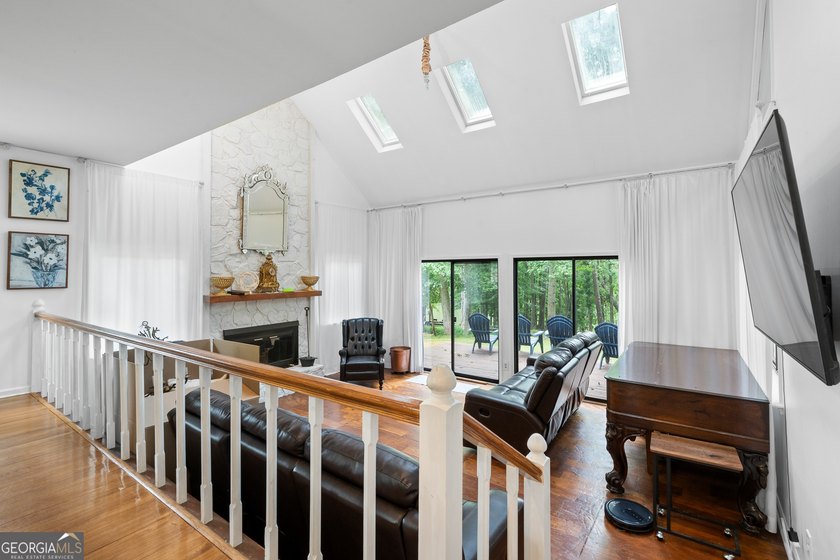 Set along the shores of Lake Lanier, this thoughtfully designed - photo 24