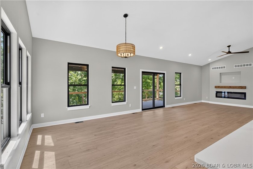 Stunning new-construction waterfront home at the Lake of the - photo 28