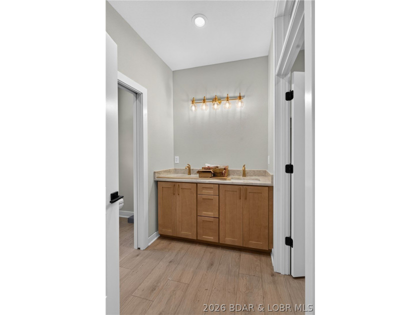 Stunning new-construction waterfront home at the Lake of the - photo 39