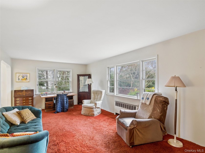 New to the market is 20 Cherry Lane in Huntington, an expansive - photo 2