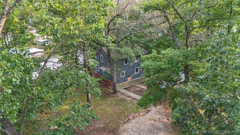 Lake life is calling! Wake up to beautiful lake views in this - photo 12
