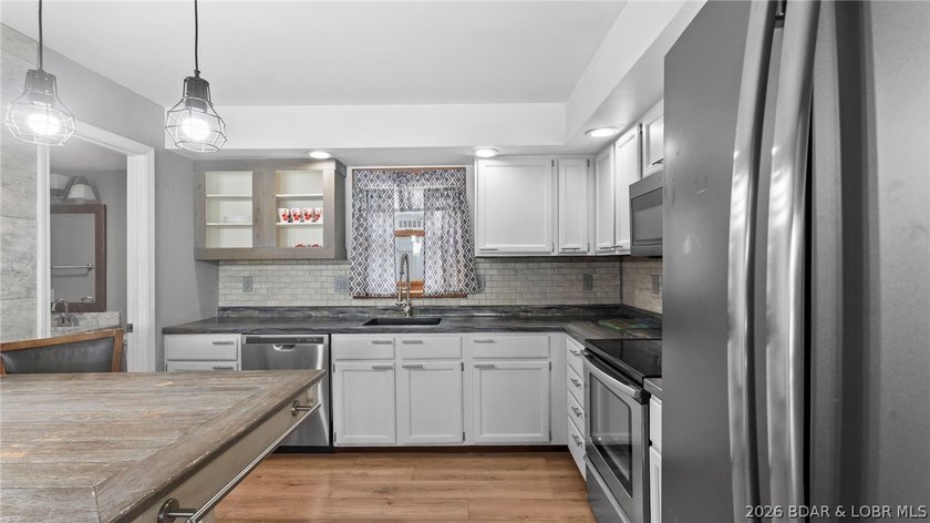 Lake life is calling! Wake up to beautiful lake views in this - photo 20