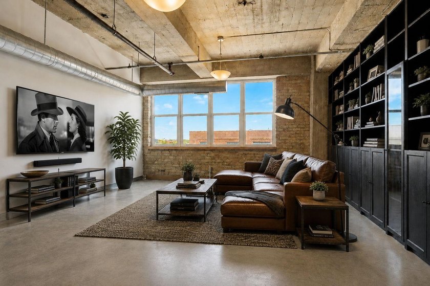 Discover authentic North Loop loft living in this bright - photo 4