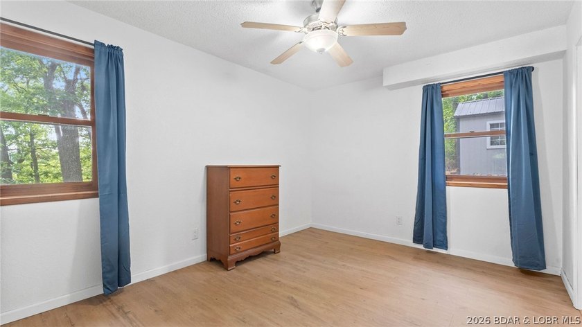 Lake life is calling! Wake up to beautiful lake views in this - photo 35