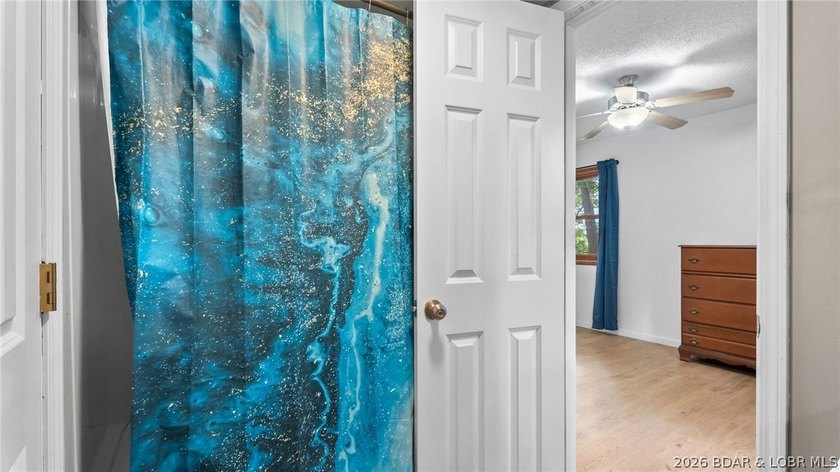 Lake life is calling! Wake up to beautiful lake views in this - photo 39