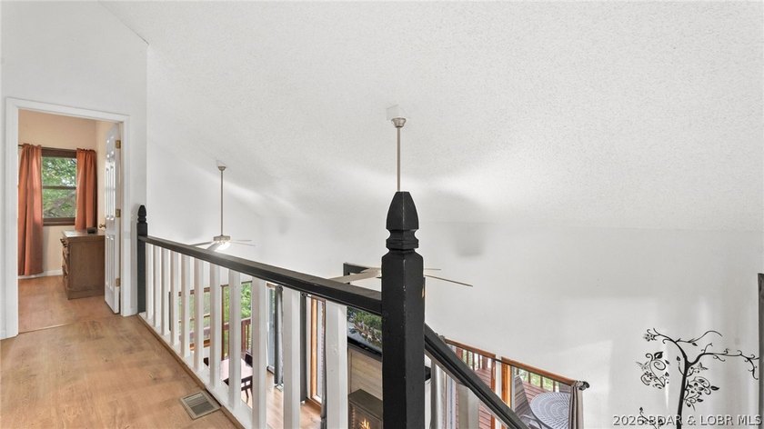 Lake life is calling! Wake up to beautiful lake views in this - photo 45
