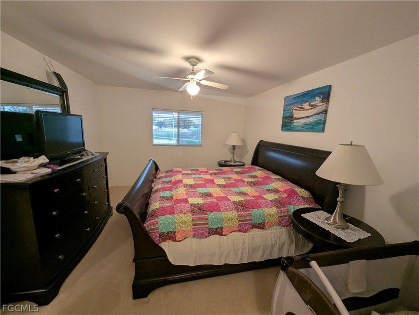Fabulous 4/2/2 fresh water canal pool home with heated pool - photo 13