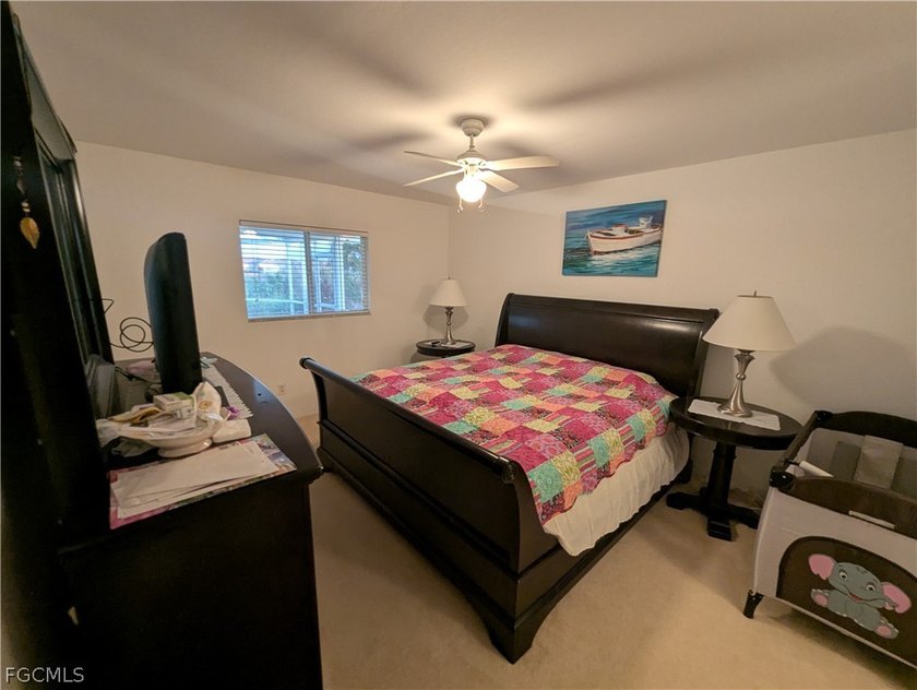 Fabulous 4/2/2 fresh water canal pool home with heated pool - photo 14