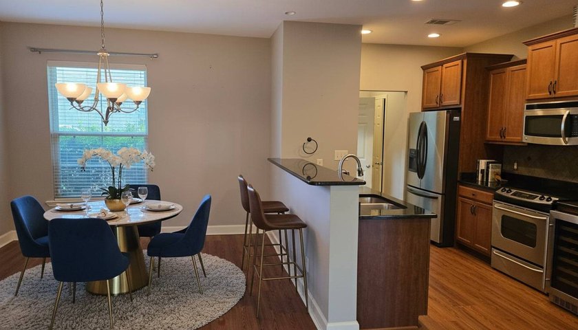 THE VIBE: Low-maintenance, resort-style living just minutes from - photo 7
