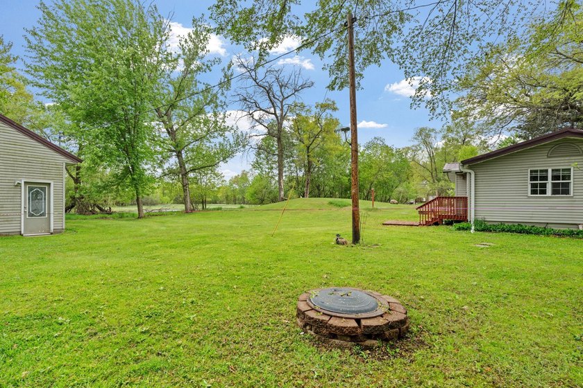 Enjoy private, peaceful one-level living just a short walk from - photo 9