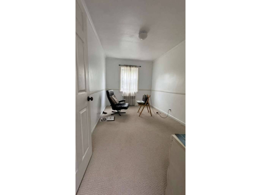 Welcome to this move-in ready brick two-family home nestled in - photo 7