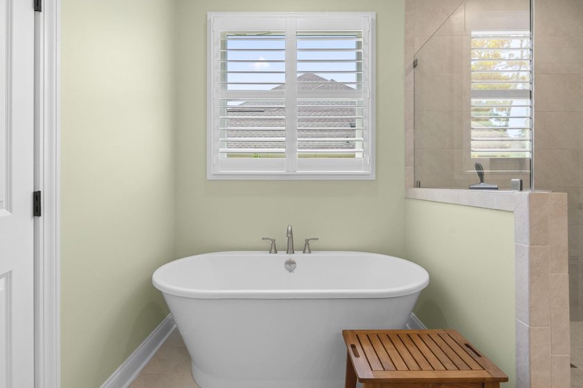 Built in 2023, this like-new home combines modern design - photo 18