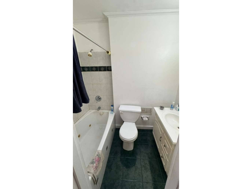 Welcome to this move-in ready brick two-family home nestled in - photo 8